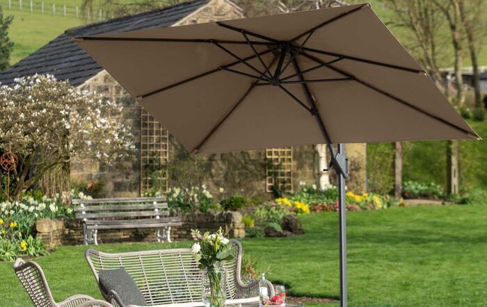 Pacific Lifestyle Voyager T1 3m x 2m Rectangular Taupe Free Arm Parasol With 90kg Wheeled Base-18-302-TA & 18-125