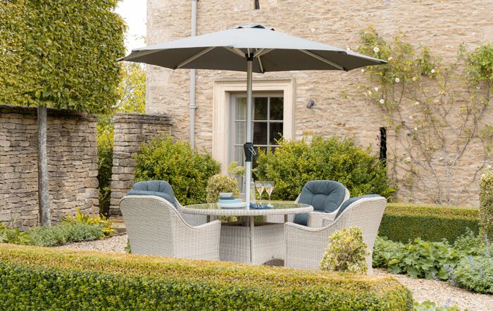 Bramblecrest Monterey 4 Seater Round Dining Set with Parasol - Grey