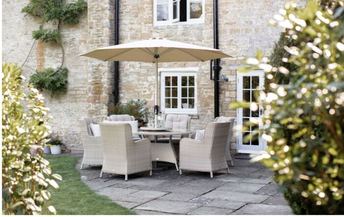 Bramblecrest Chedworth 6 Seat Round Dining Set with Lazy Susan, Parasol and Base - Sandstone-X20WCW140RD1