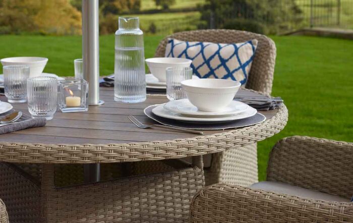 Bramblecrest Tetbury 4 Seater Round Dining Set with Parasol & Base - Nutmeg Bramblecrest Tetbury 4 Seater Round Dining Set with Parasol & Base - Nutmeg