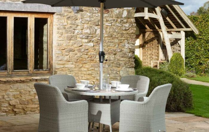 Bramblecrest Tetbury Round Four Seater Dining Set with Parasol - Cloud Bramblecrest Tetbury Round Four Seater Dining Set with Parasol - Cloud
